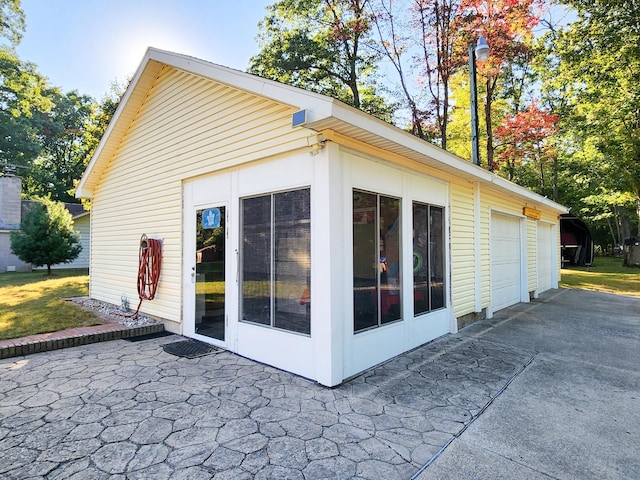 view of side of property featuring a garage