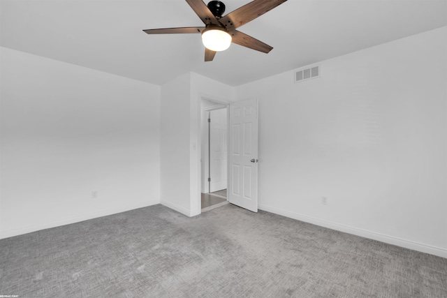 interior space with ceiling fan