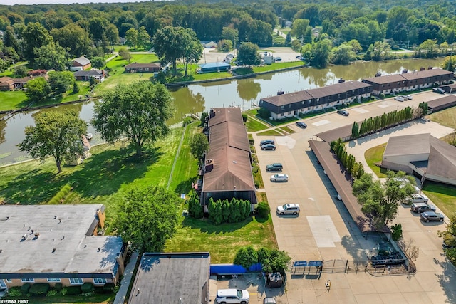 drone / aerial view with a water view