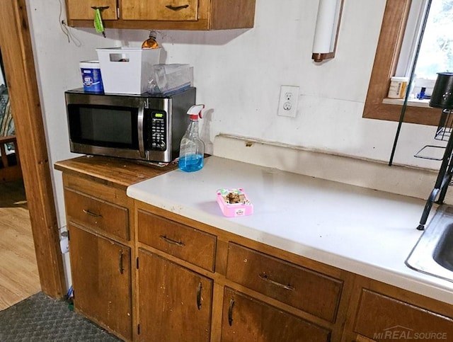 kitchen with hardwood / wood-style floors