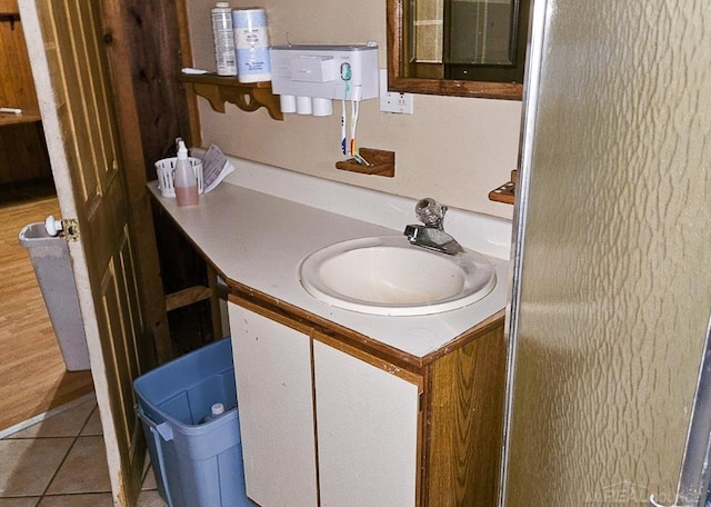 bathroom featuring tile patterned floors and vanity