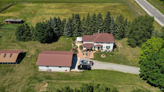 birds eye view of property featuring a rural view