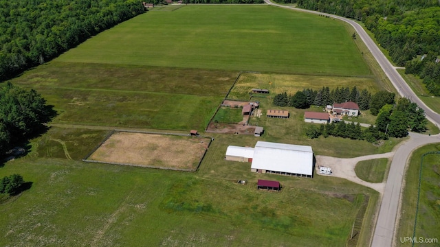 birds eye view of property featuring a rural view