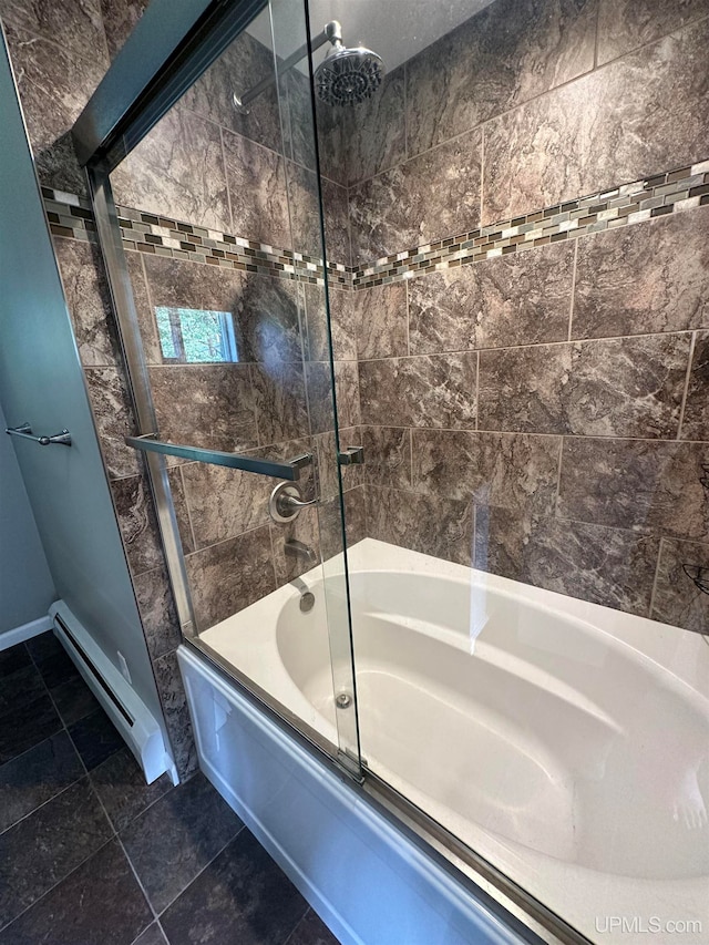 bathroom with a baseboard radiator, tile patterned flooring, and enclosed tub / shower combo