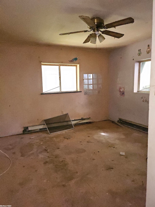 empty room with ceiling fan and carpet floors