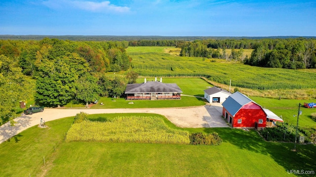 birds eye view of property featuring a rural view