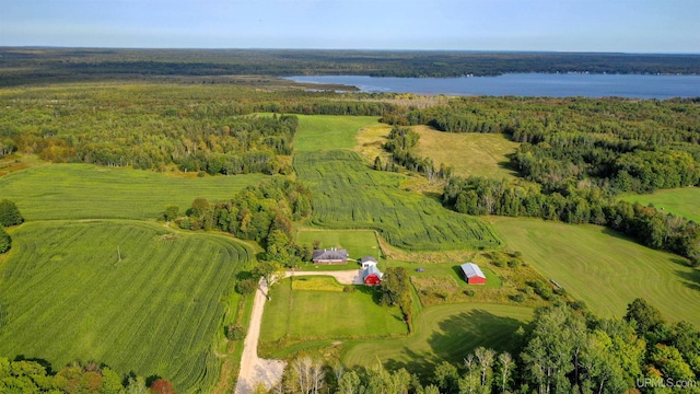 birds eye view of property with a rural view and a water view