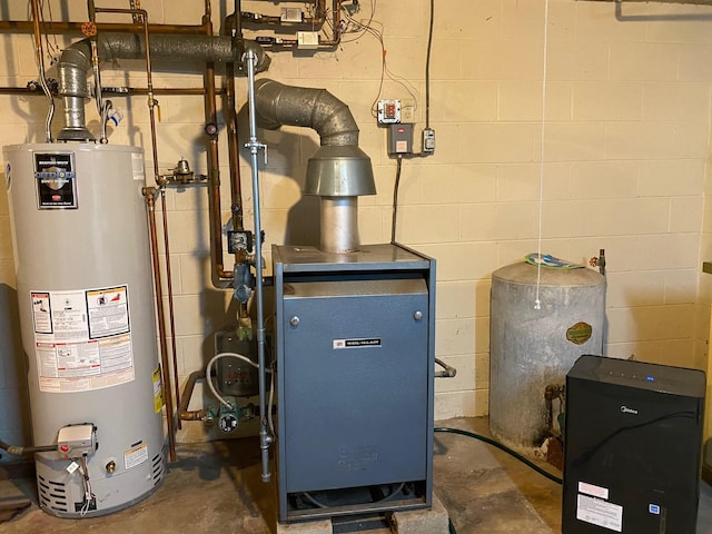 utility room with water heater