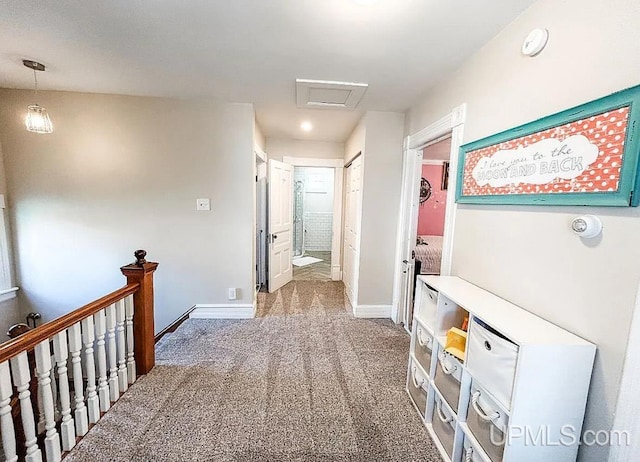 hallway featuring carpet