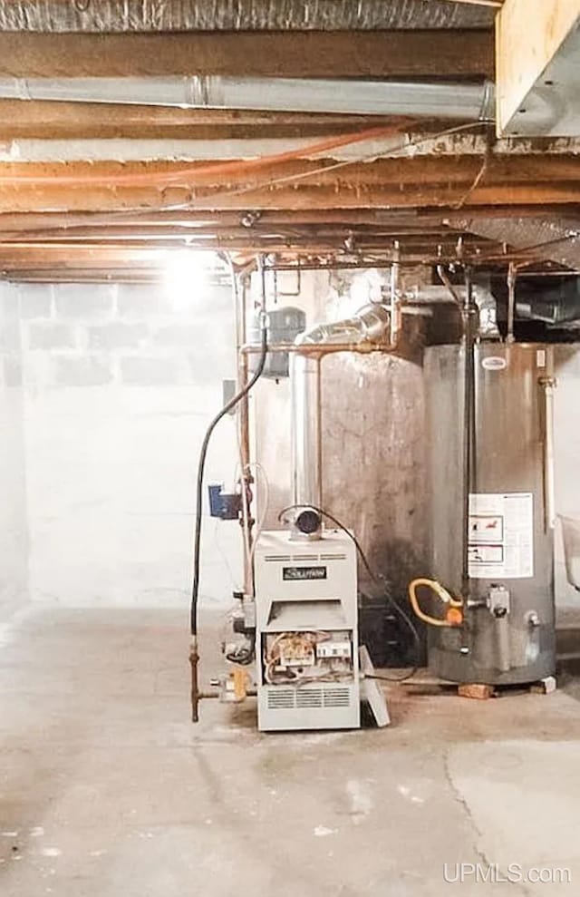 basement featuring water heater