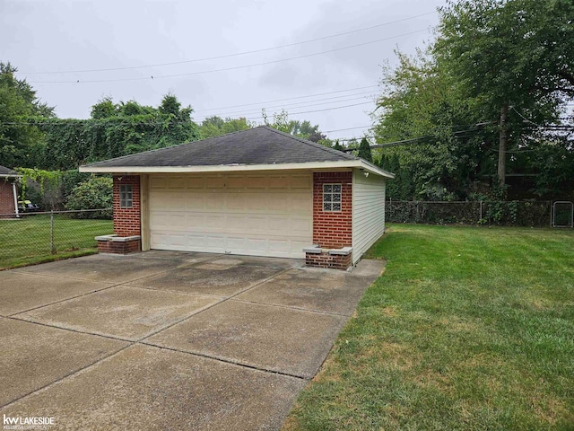 garage with a yard