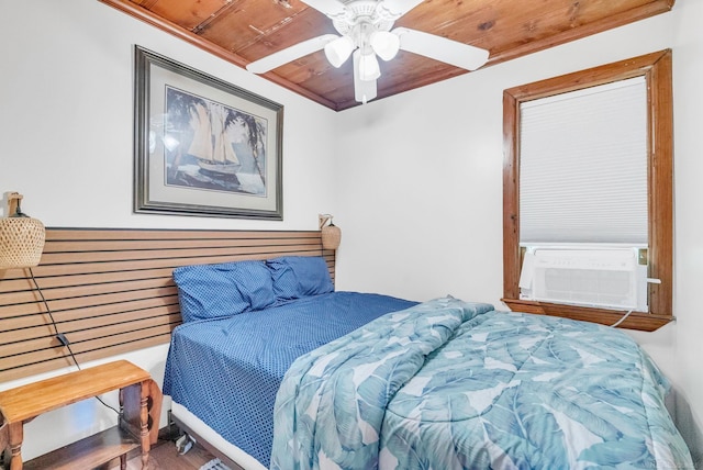 bedroom with cooling unit, ceiling fan, and wooden ceiling