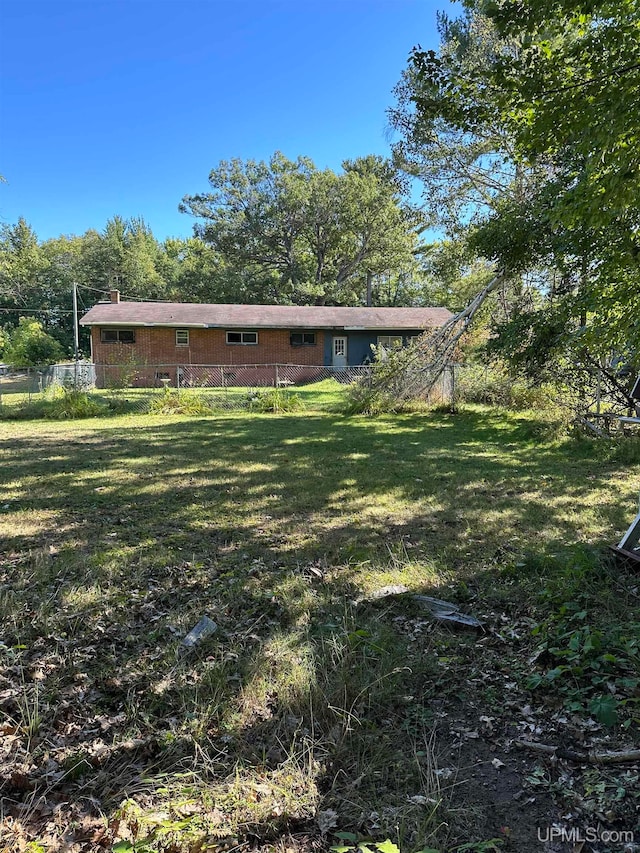 exterior space featuring a yard