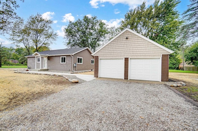 exterior space with an outdoor structure and a garage