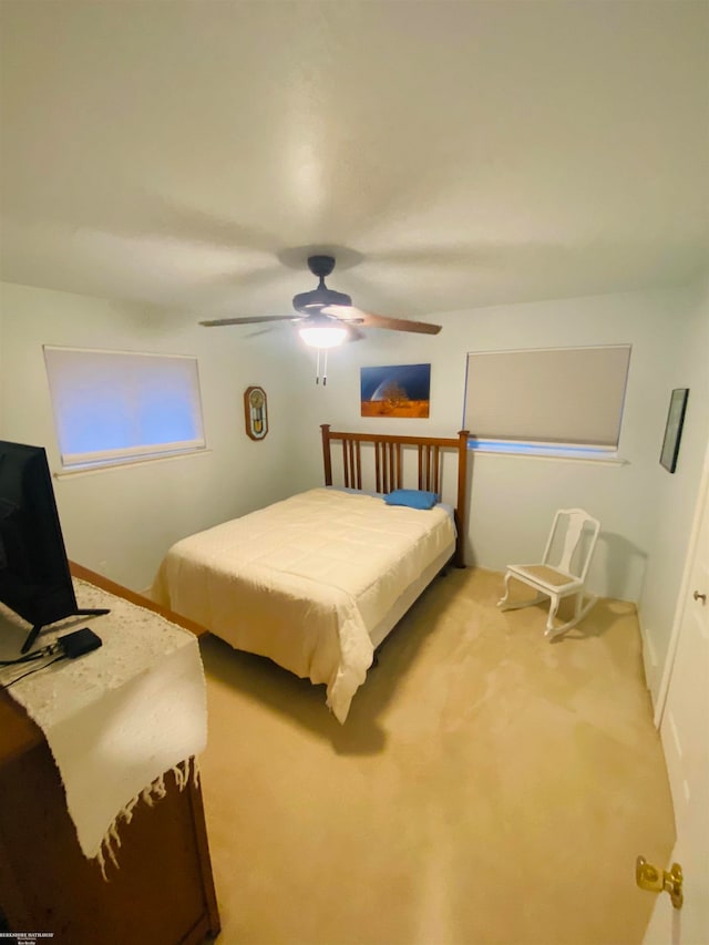 bedroom featuring carpet floors and ceiling fan