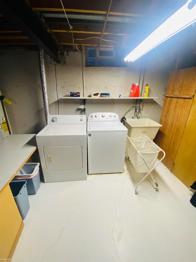 laundry area featuring washing machine and dryer