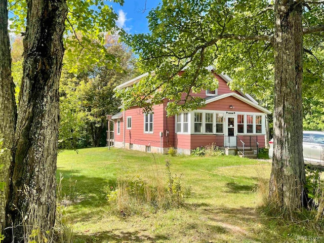 exterior space with a front yard