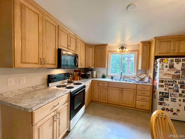 kitchen with white appliances and sink