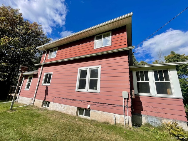 156 N Carlshend Rd, Skandia, MI 49885 - view of home's exterior with a yard