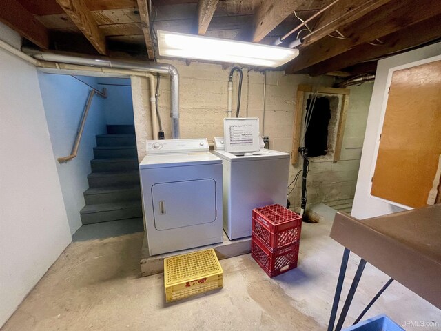 basement featuring electric water heater and heating unit