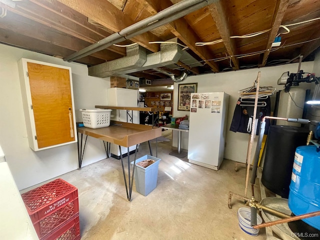 basement with white refrigerator