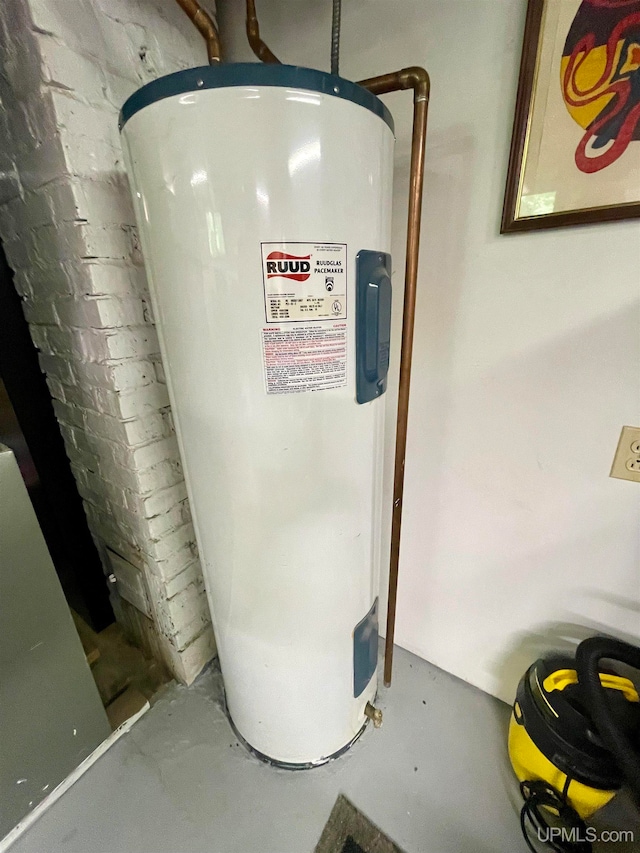 utility room with electric water heater