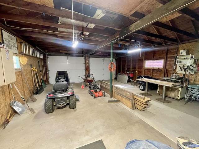 156 N Carlshend Rd, Skandia, MI 49885 - garage with a workshop area