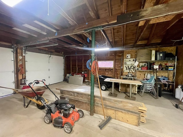 156 N Carlshend Rd, Skandia, MI 49885 - garage with a workshop area