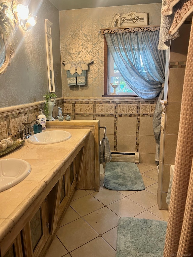 bathroom with tile walls, tile patterned floors, and vanity