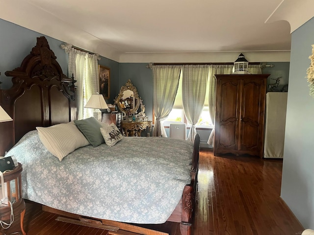 bedroom featuring hardwood / wood-style floors