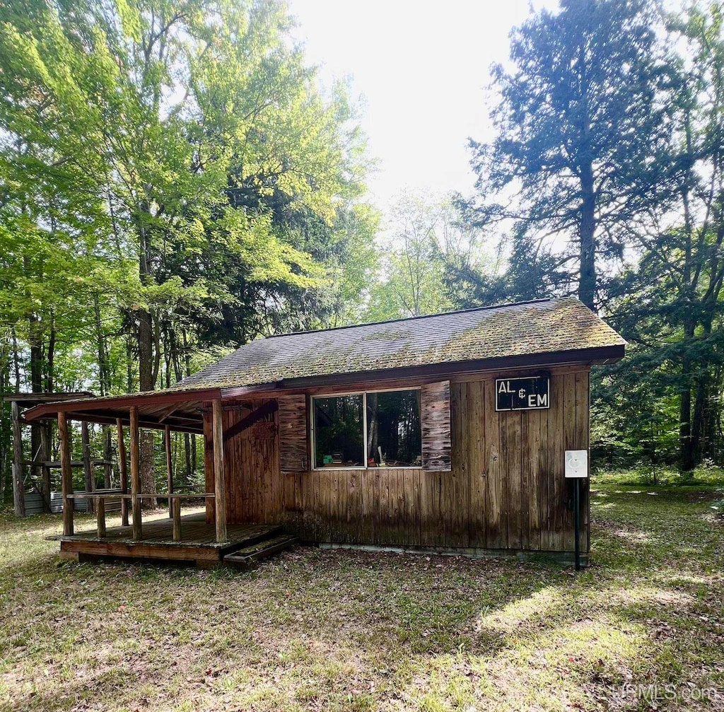 view of home's exterior with a yard