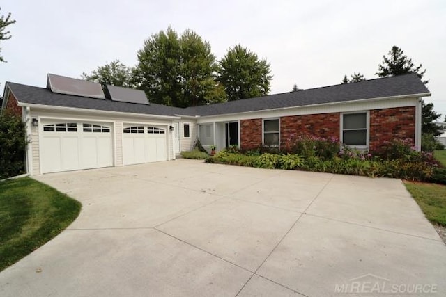 single story home featuring a garage