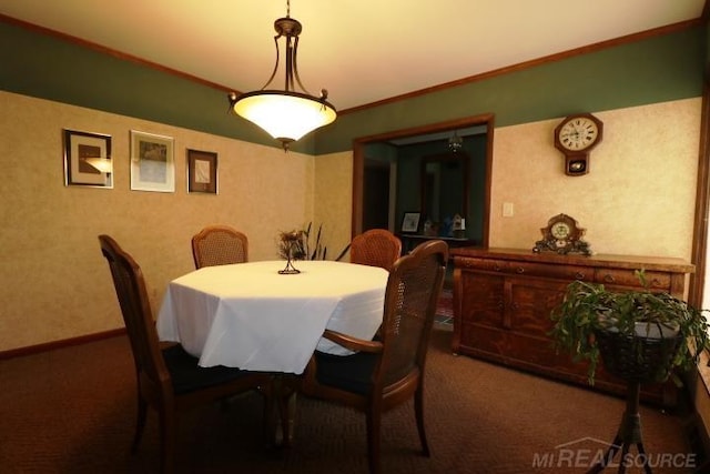 dining area with crown molding