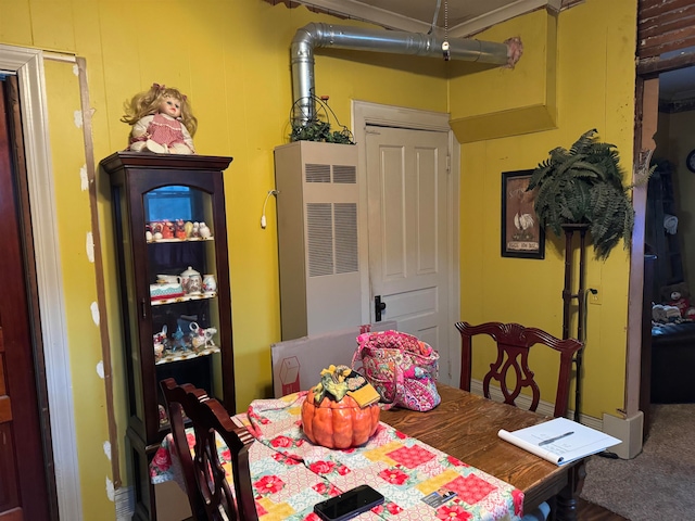 dining space with carpet flooring