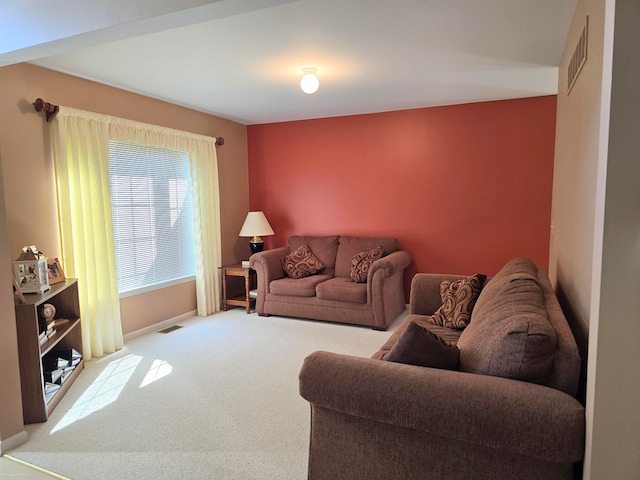 living room featuring light colored carpet