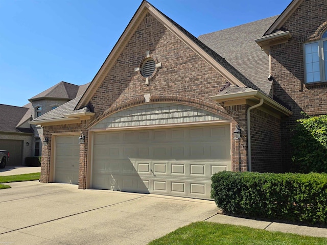 view of property exterior with a garage