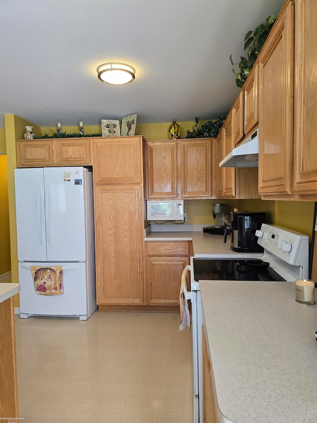 kitchen featuring white appliances