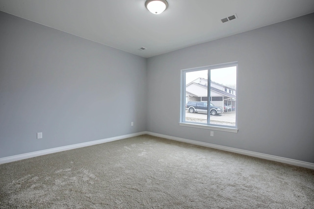 unfurnished room with carpet