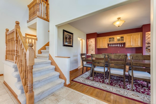 dining space with light hardwood / wood-style floors