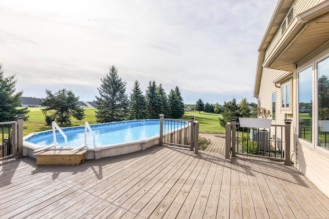 view of pool with a deck