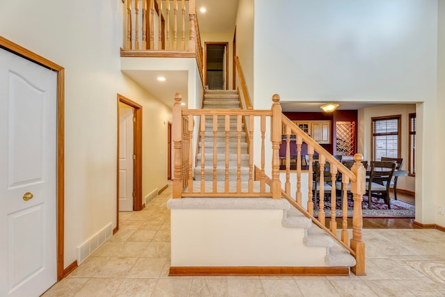 stairs with a high ceiling