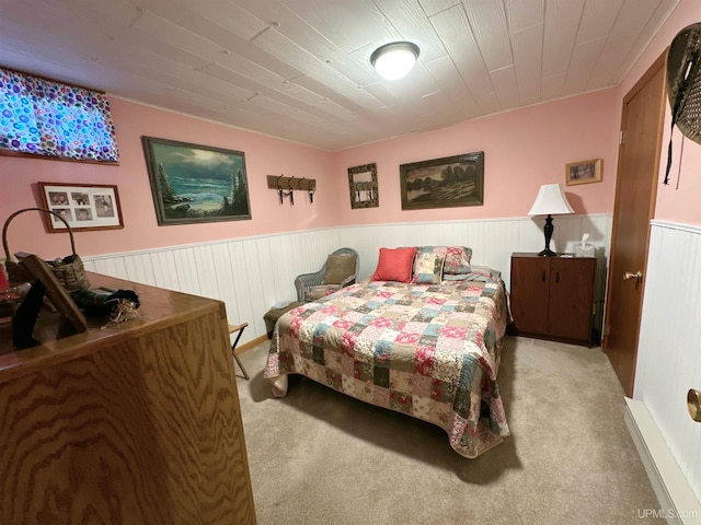 bedroom featuring light colored carpet