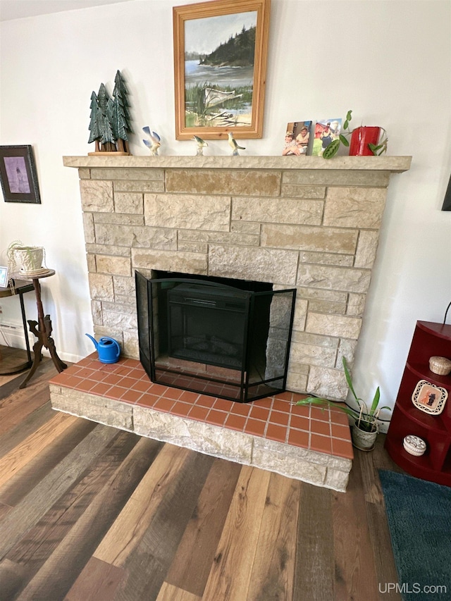 details with a fireplace and hardwood / wood-style floors