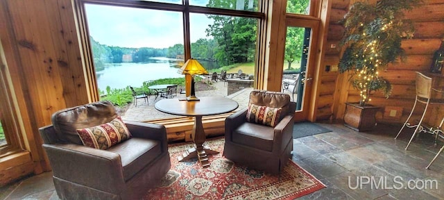 sunroom with a water view