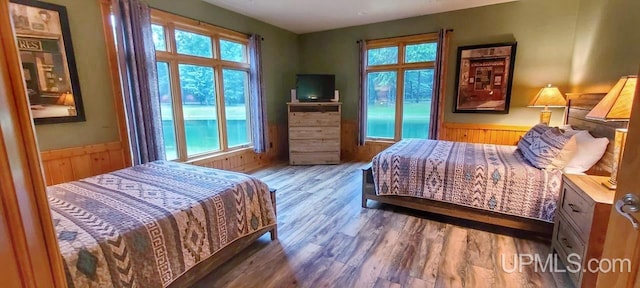 bedroom featuring wood-type flooring