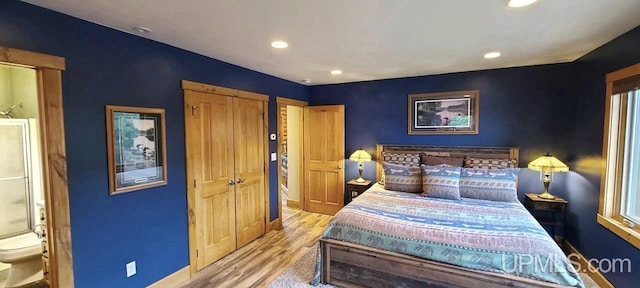 bedroom featuring light hardwood / wood-style flooring