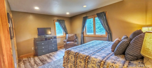 bedroom with light hardwood / wood-style floors