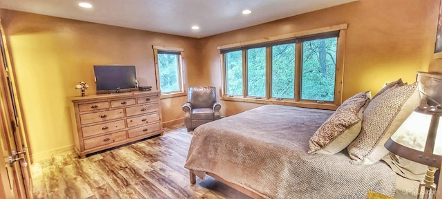 bedroom featuring light wood-type flooring