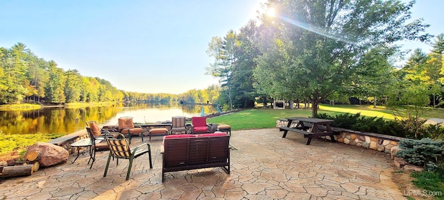 view of patio featuring a water view