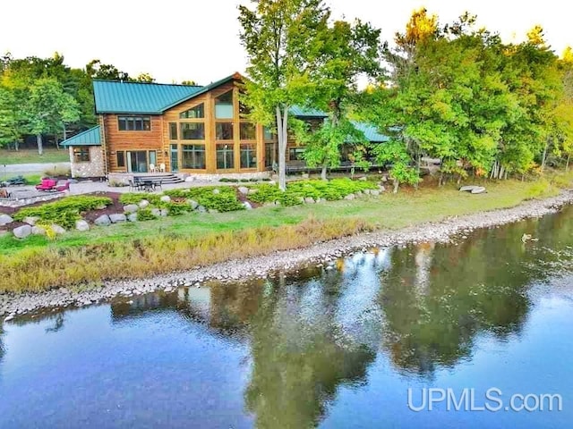 exterior space featuring a water view